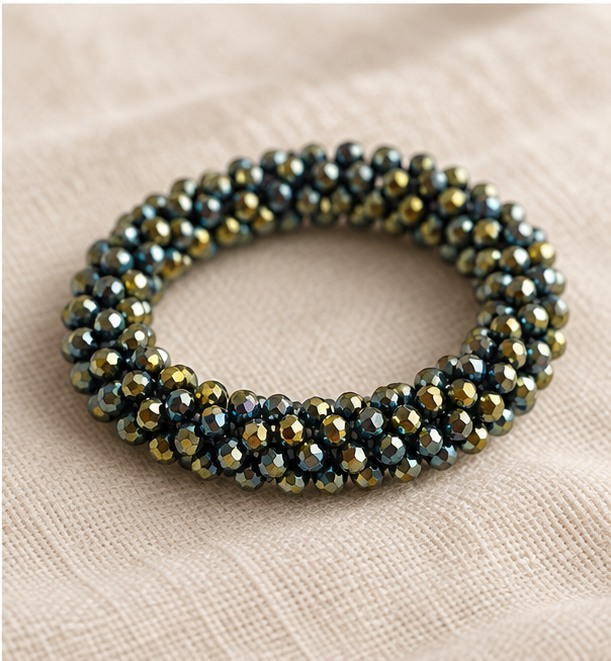 Facetkralen armband — Blauw met goudkleurige schittering — linnen