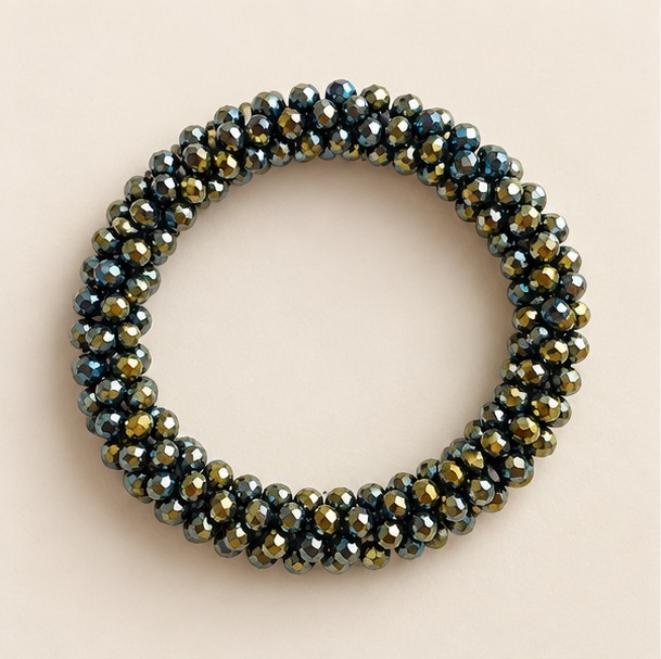Facetkralen armband — Blauw met goudkleurige schittering — product